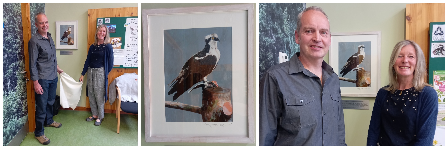 A painting of an osprey unveiled by a man and woman