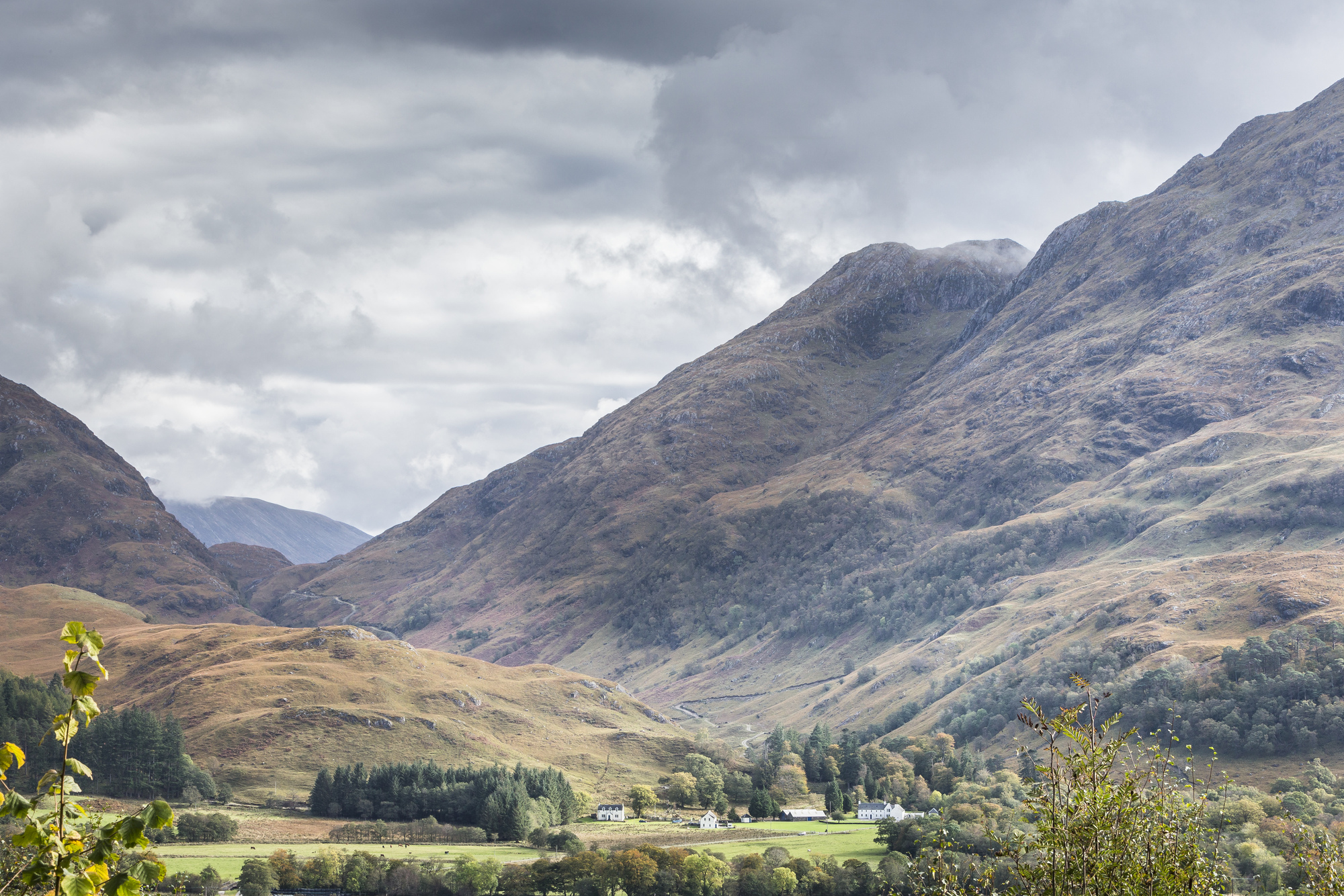 An areal view of a valley between two Munros.