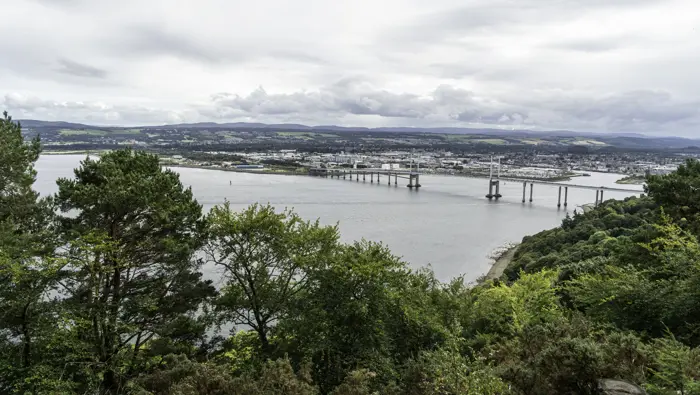 Bridge over water leading to the city of Inverness.
