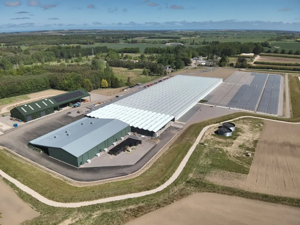 Drone shots over large buildings.
