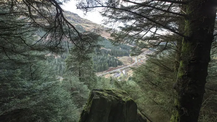 Aerial view of motorway from high up in forest, Ardgartan, Argyll Forest Park