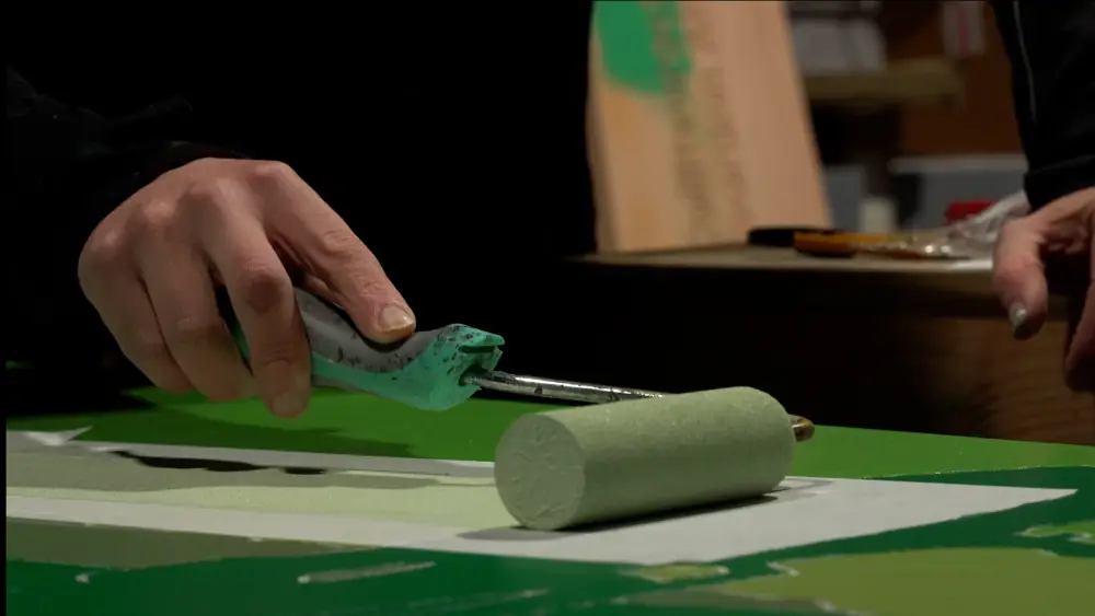 Person with a paint roller